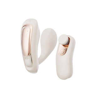 White and rose gold vibrator on a white background