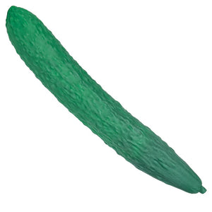 A green textured cucumber toy or prop shown diagonally on a plain white background.